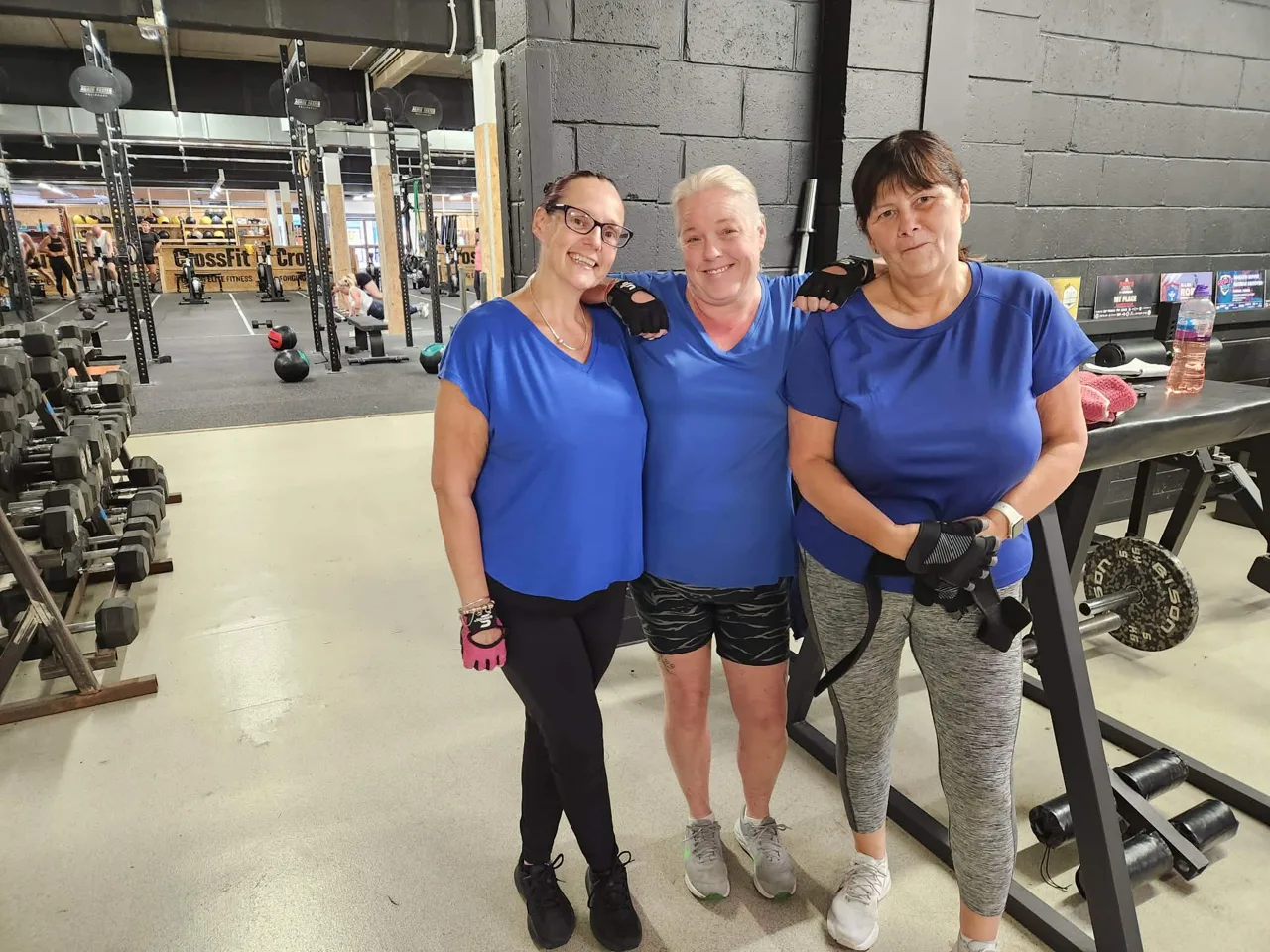 Three Phoenix members smiling together