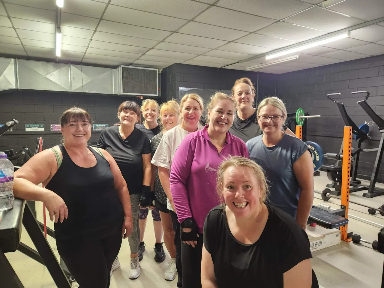 Phoenix members smiling together after a training session